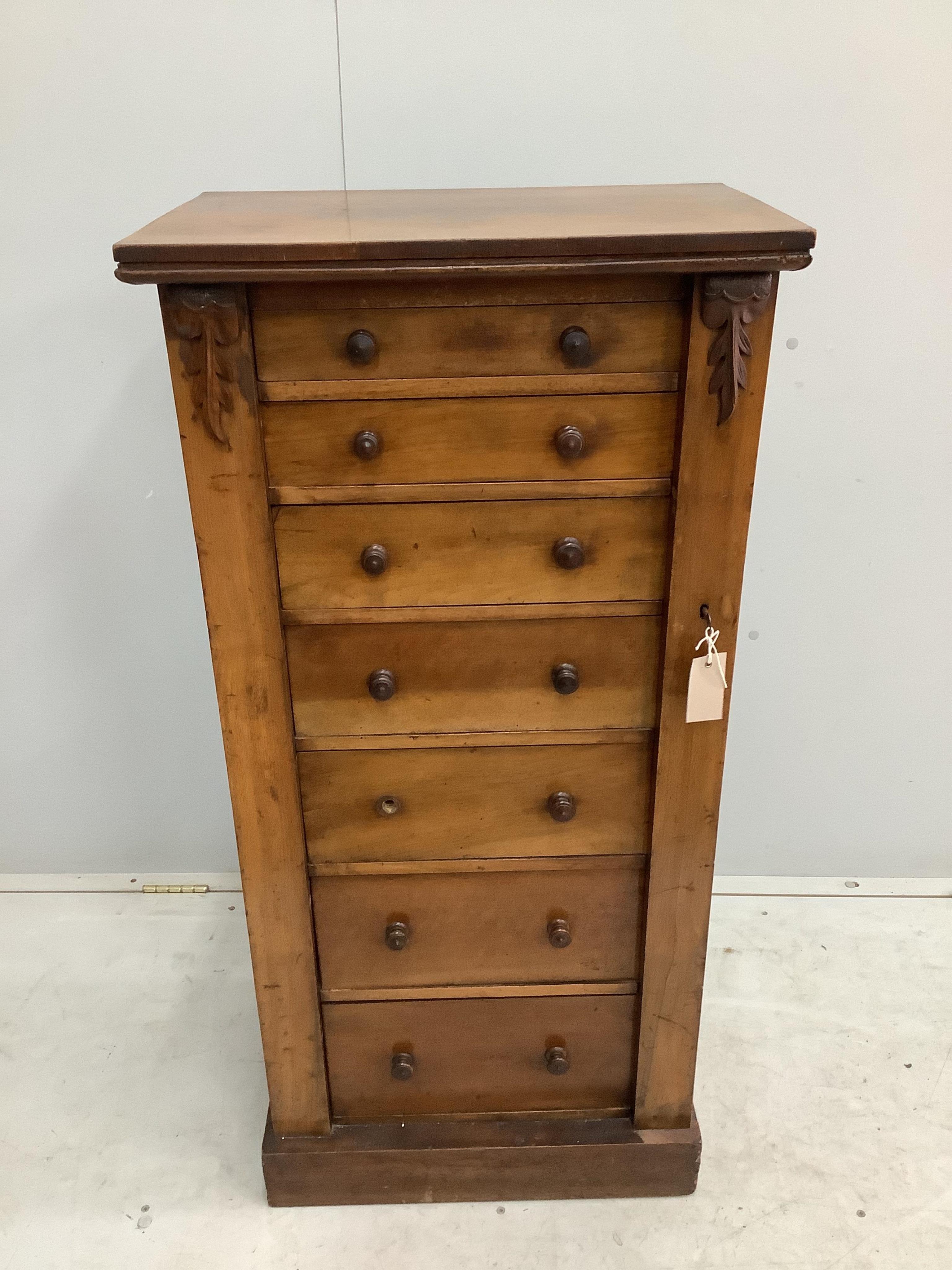 A Victorian walnut Wellington chest, width 54cm, depth 36cm, height 112cm. Condition - fair